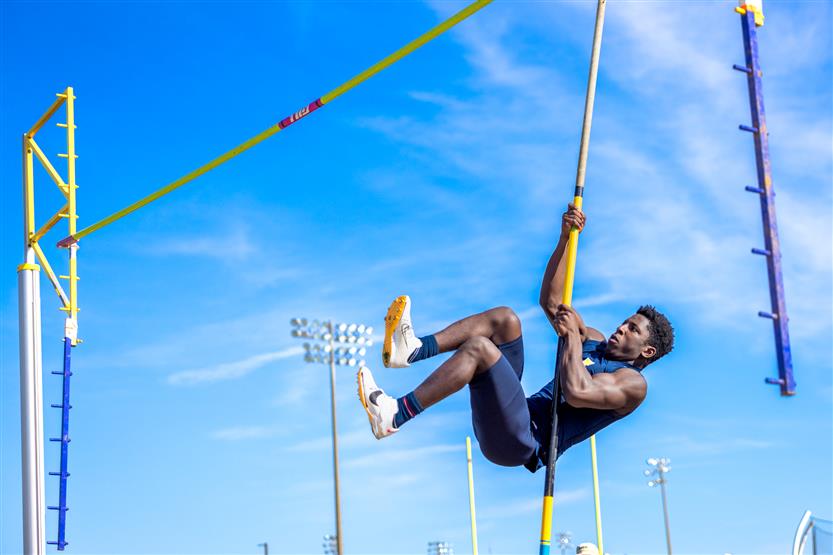 Students run in track and field